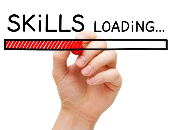 Hand with marker filling in a skills loading bar
